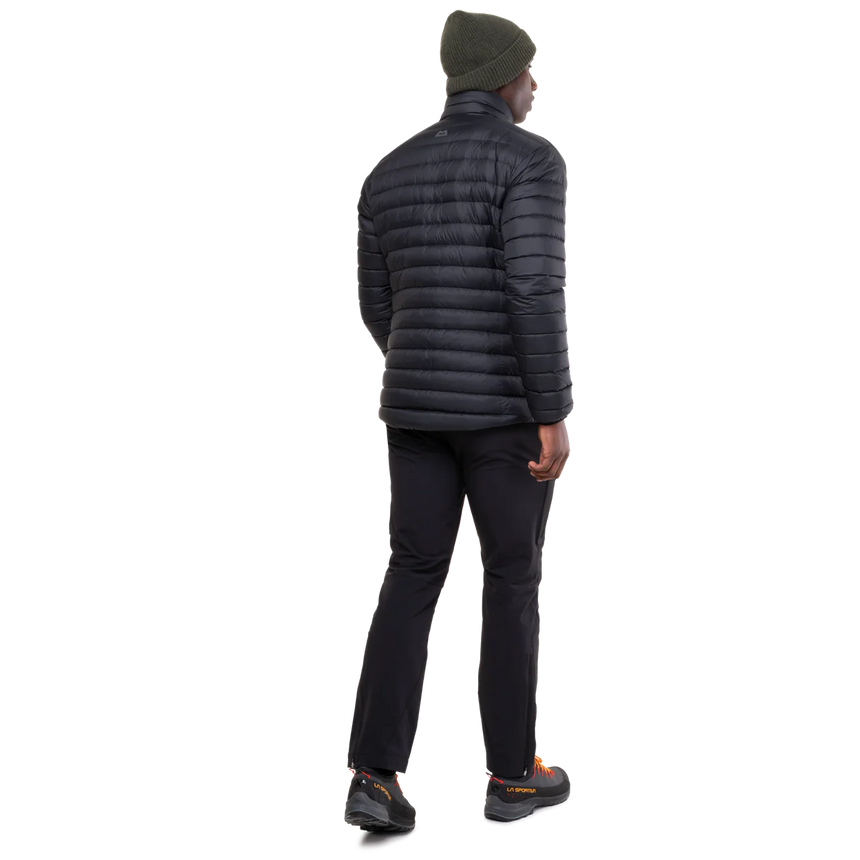 Mountain Equipment Earthrise Men's Jacket in Black packed into hand pocket showing twin karabiner carry loops