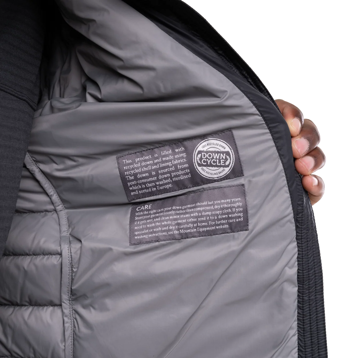 Mountain Equipment Earthrise Men's Jacket in Black - lifestyle view showing lightweight recycled down insulation for ski touring and alpine climbing