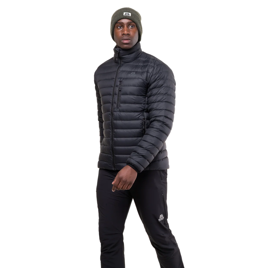 Mountain Equipment Earthrise Men's Jacket in Black - side view showing fit and dual tether hem drawcords