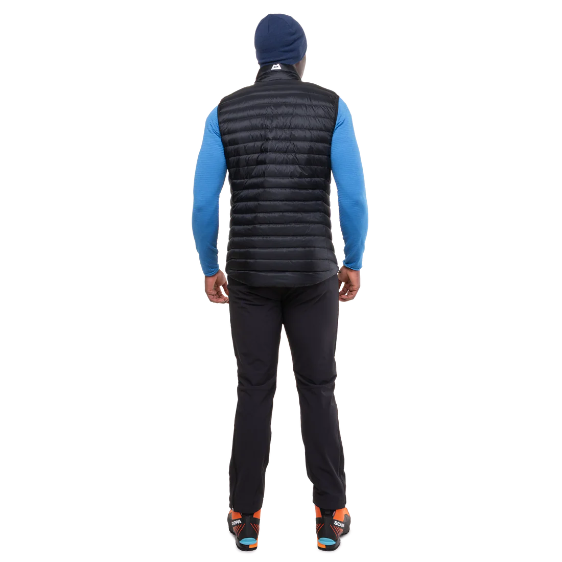 Mountain Equipment Frostline Men's Vest in Black worn on model - full length back view showing DRILITE Loft 20D shell and adjustable hem drawcords