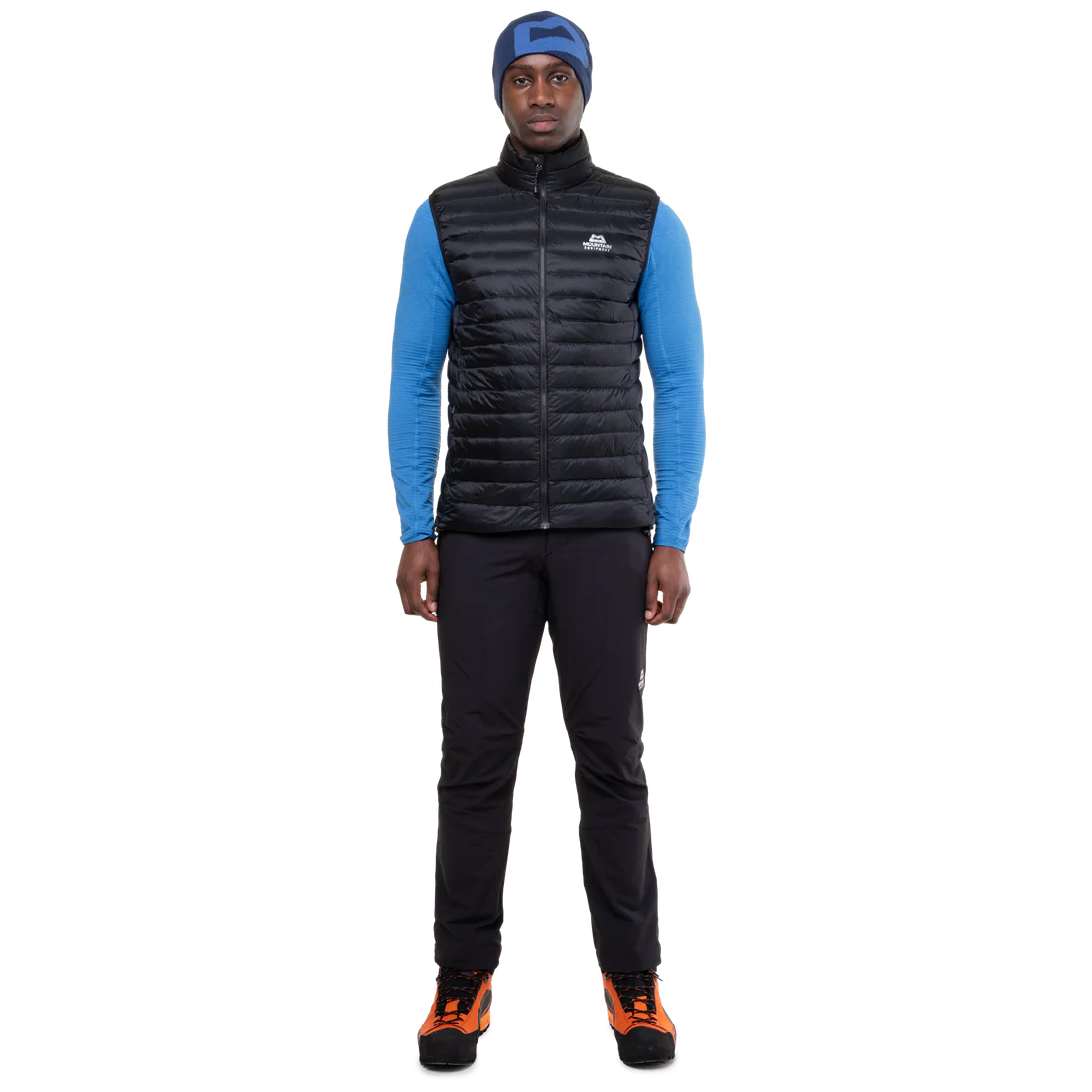 Mountain Equipment Frostline Men's Vest in Black worn on model - full length front view showing slim fit and DRILITE Loft 20D construction