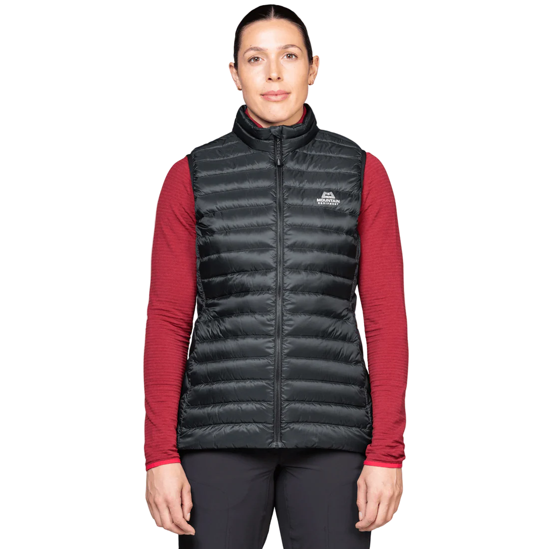 Mountain Equipment Frostline Women's Vest in Black worn on model - front view showing DRILITE Loft 20D shell and stitch-through narrow baffles