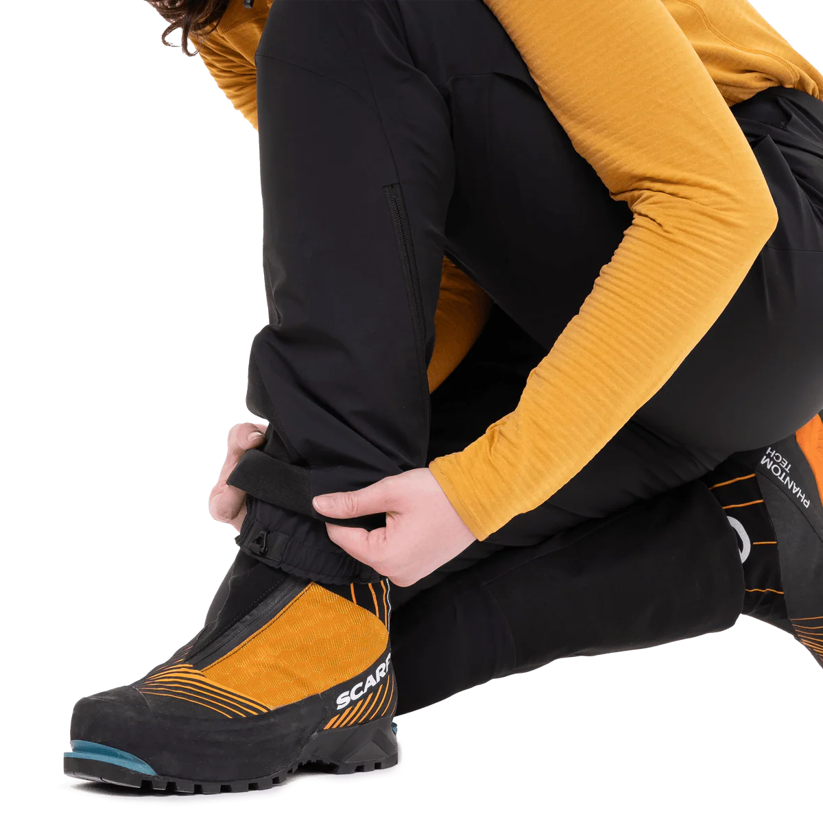 Ankle zip with internal gusset panel on Mountain Equipment G2 Mountain Women's Pant in Black for mountain boots