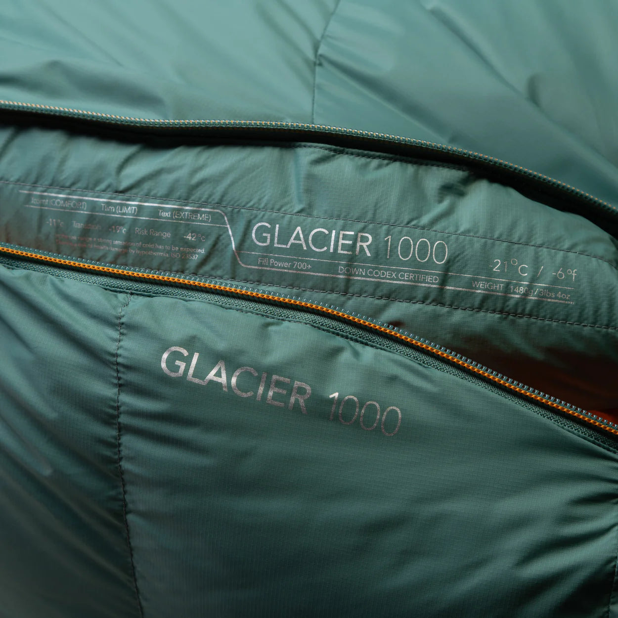 5-baffle hood with Lode Lock magnetic closure and collar drawcords detail on Mountain Equipment Glacier 1000 Women's Sleeping Bag in Sage