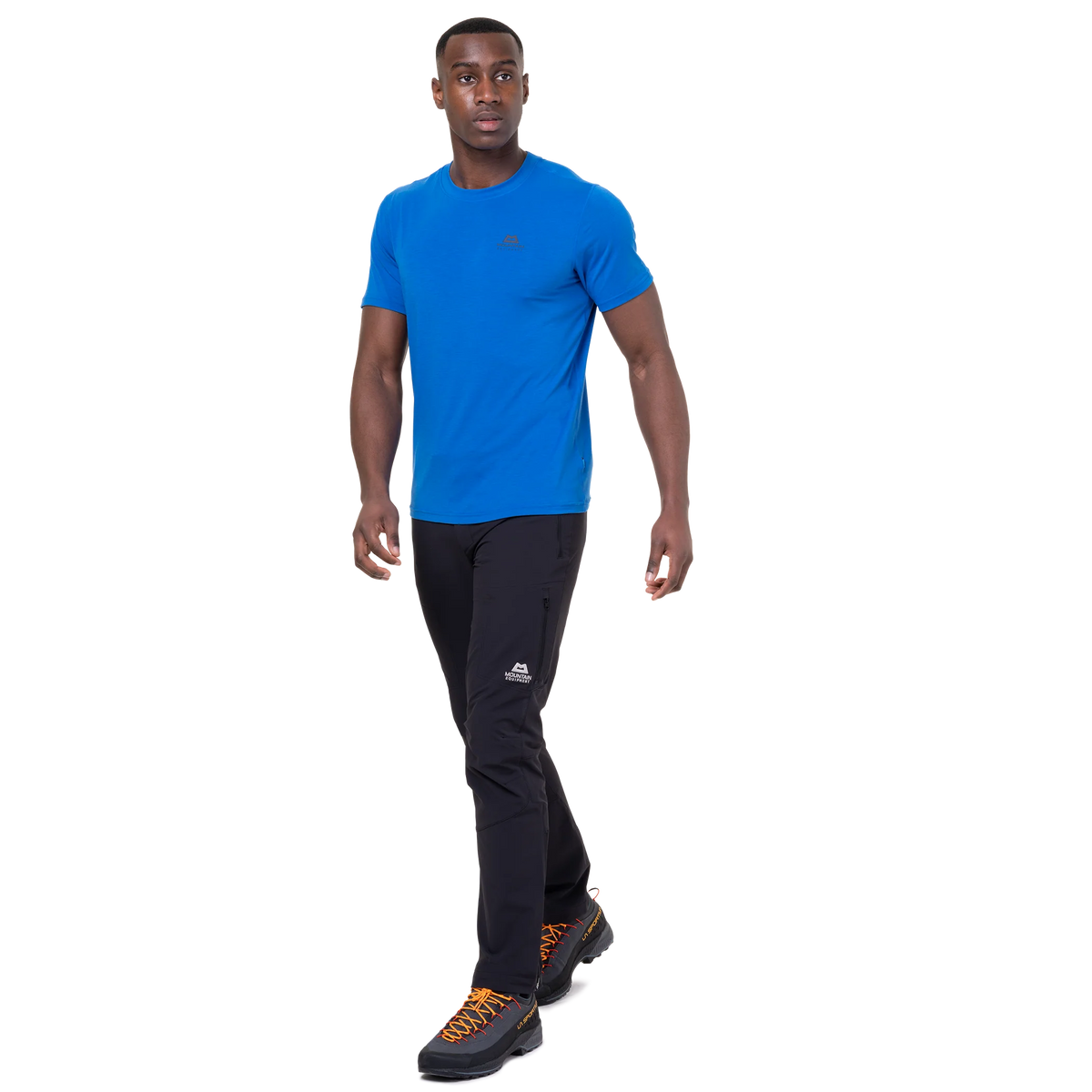 Mountain Equipment Groundup Men's Tee in Atlantic Blue - lifestyle view showing lightweight technical tee for rock climbing on hot days