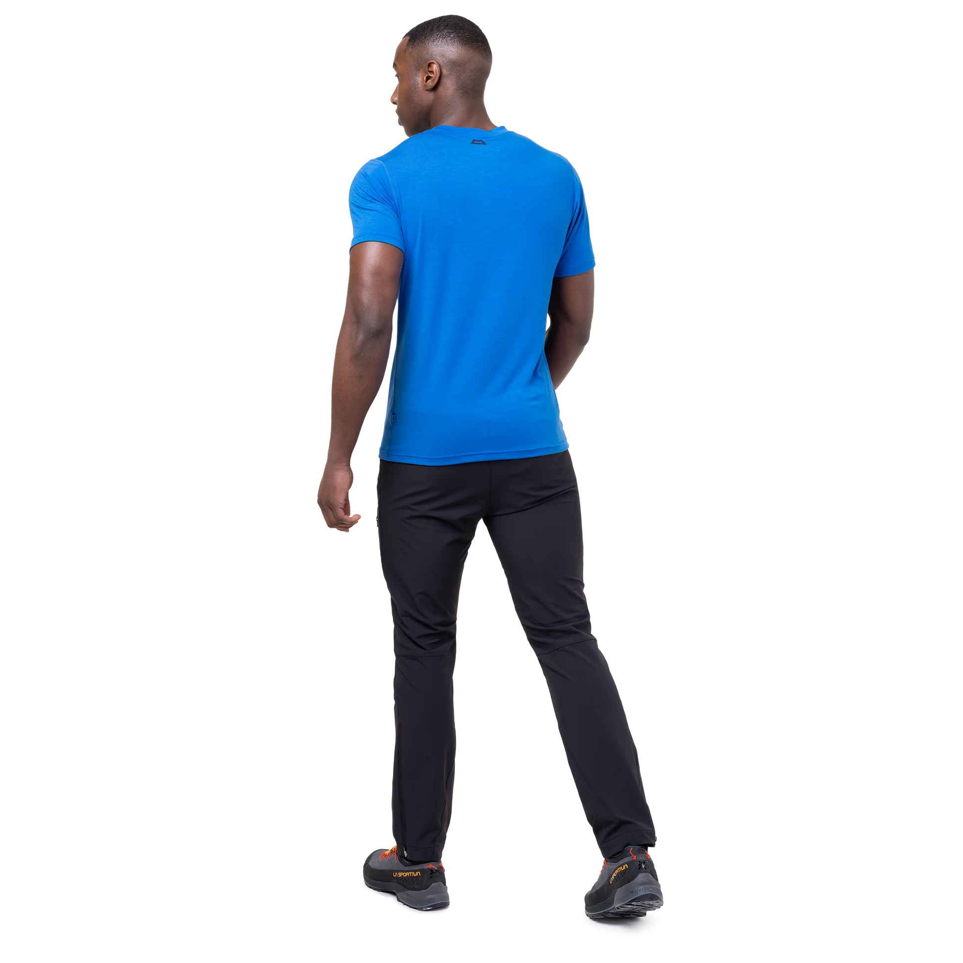 Mountain Equipment Groundup Men's Tee in Atlantic Blue - lifestyle view showing fast-drying stretchy tee for mountain walking and trekking