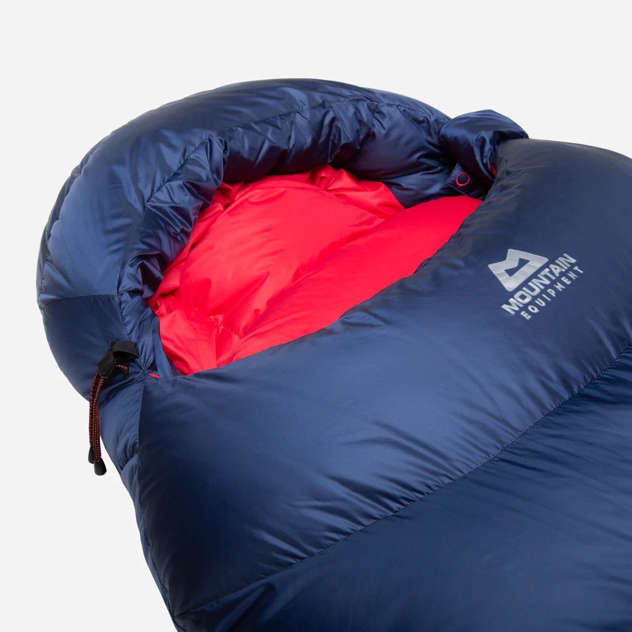 Gemini full-length entry zip baffle detail on Mountain Equipment Helium 250 Women's Sleeping Bag in Medieval Blue with Lode Lock magnetic closure