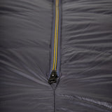 Mountain Equipment Helium GT 250 Sleeping Bag in Anvil Grey packed into waterproof roll-top stuff sack showing lightweight packable construction