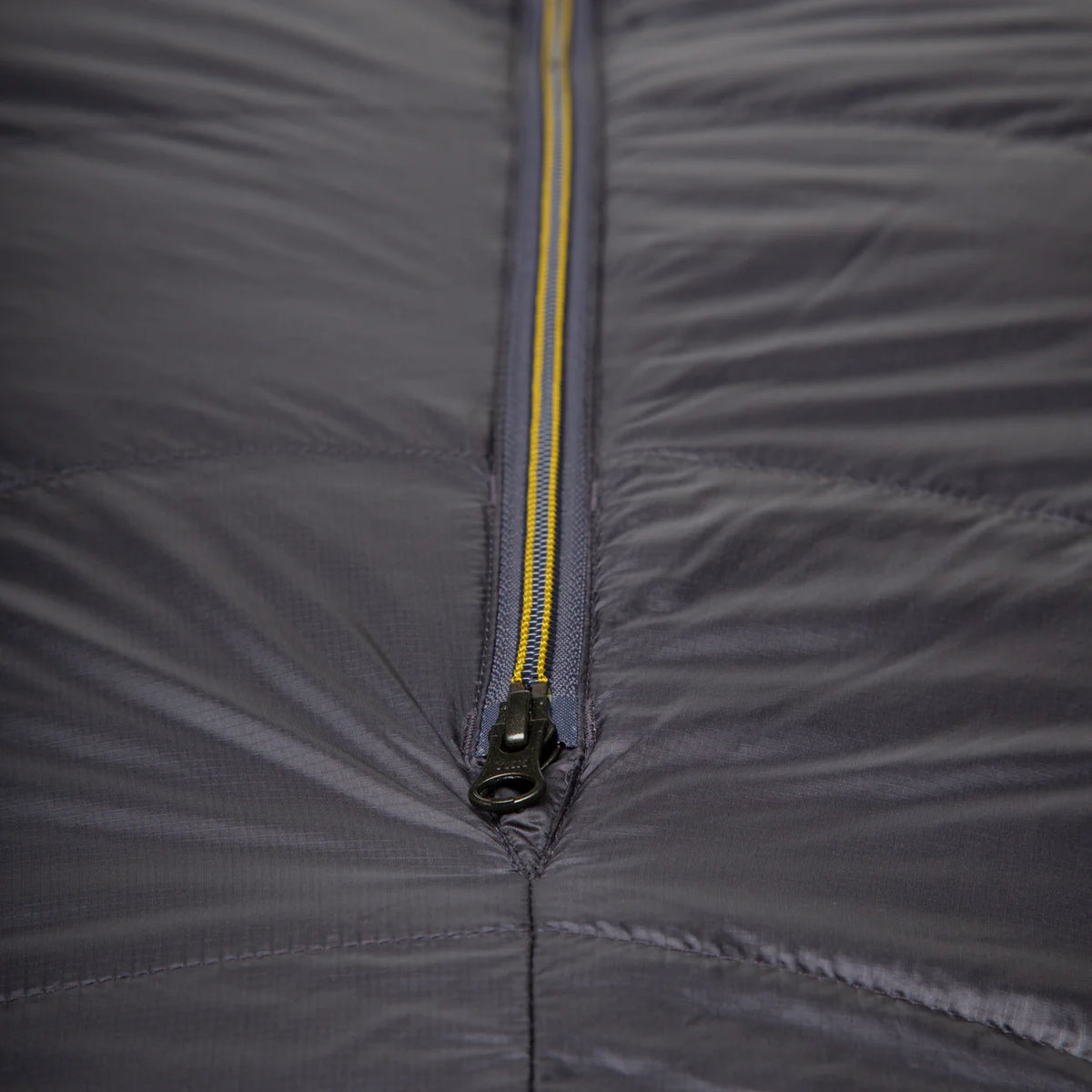 Recycled Supersoft 20D lining detail on Mountain Equipment Helium GT 400 Sleeping Bag in Anvil Grey showing PFAS-free DWR finish