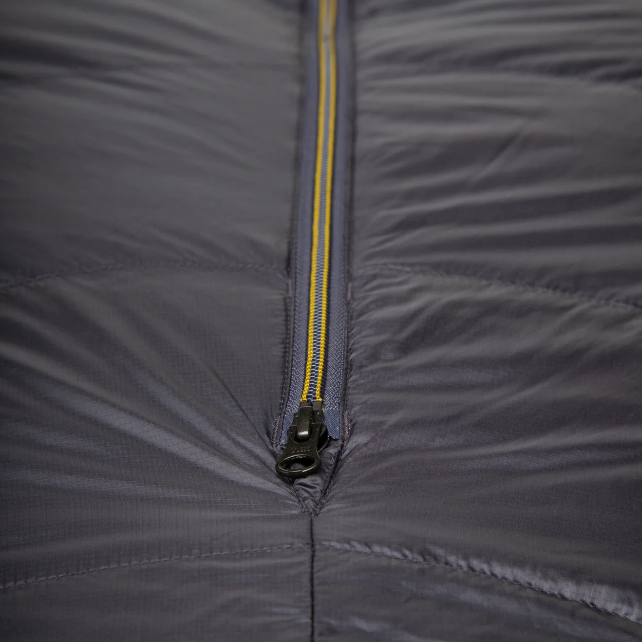 Recycled Supersoft 20D lining detail on Mountain Equipment Helium GT 400 Sleeping Bag in Anvil Grey showing PFAS-free DWR finish