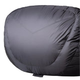 Mountain Equipment Helium GT 600 Sleeping Bag in Anvil Grey - lifestyle view showing roomy GT fit sleeping bag for extended spring and autumn trekking