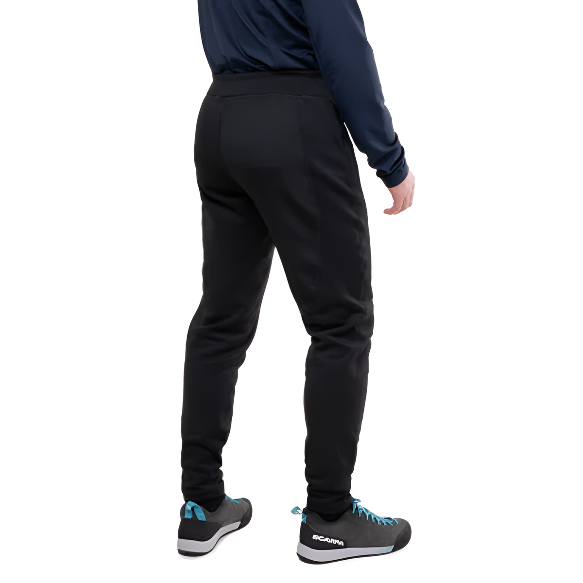 Mountain Equipment Jorasses Men's Pant in Black - three quarter view showing regular fit and Powerfleece fabric