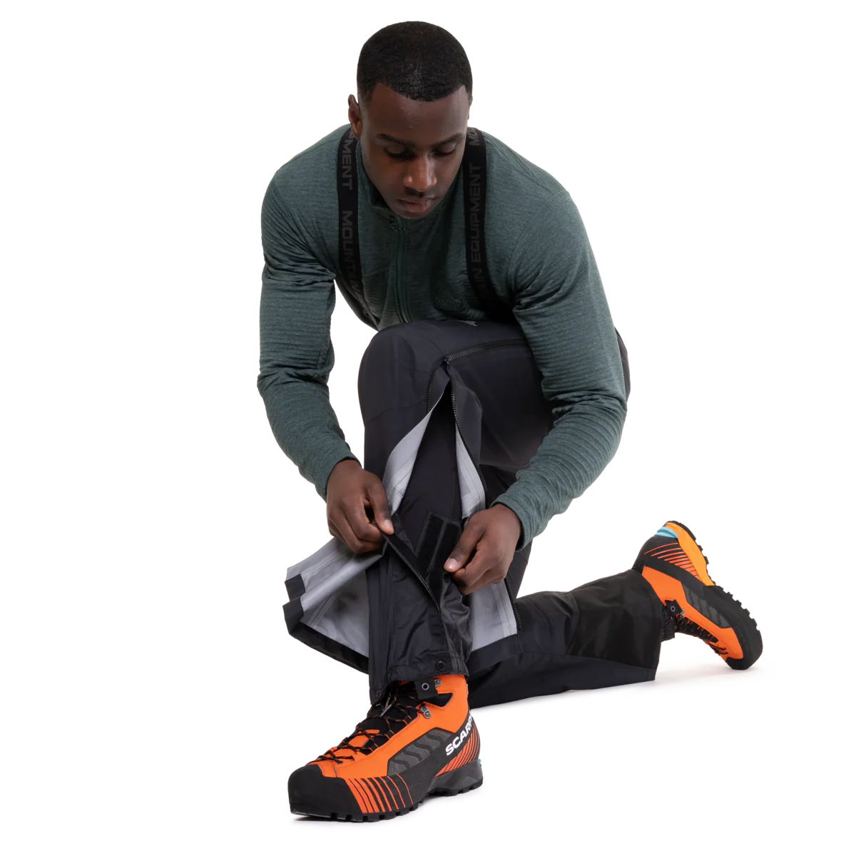 Full-length two-way YKK moulded side zip with inner storm flap on Mountain Equipment Karakoram Mountain Men's Pant in Black