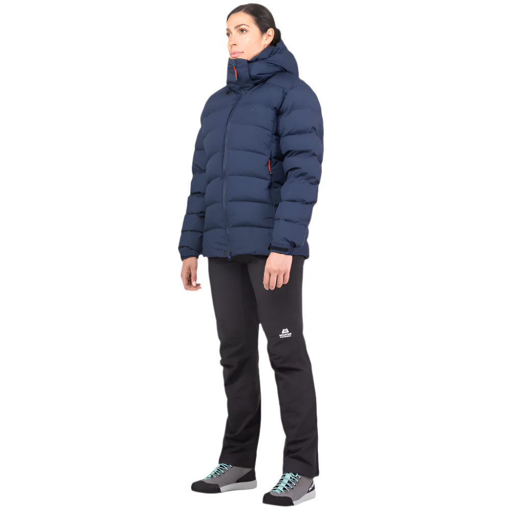 Mountain Equipment Lightline Eco Women's Jacket in Cosmos - lifestyle view showing sustainable technical duvet jacket for mountaineering in sub-zero conditions