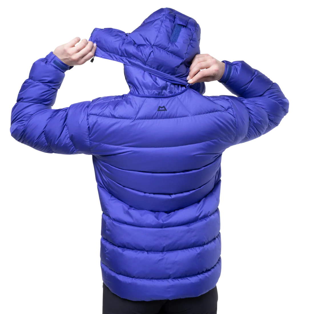 Mountain Equipment Lightline Women's Jacket in Clematis - lifestyle view showing technical duvet jacket for mountaineering in sub-zero conditions