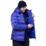Mountain Equipment Lightline Women's Jacket in Clematis packed into stuff sack showing lightweight packable construction
