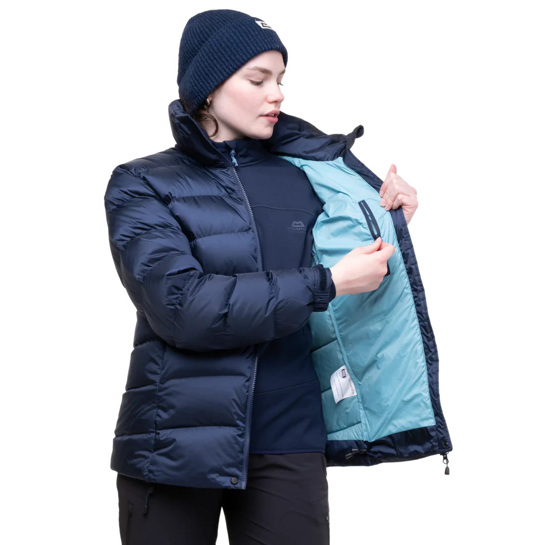 Stitch-through baffle construction detail on Mountain Equipment Lightline Women's Jacket in Cosmos showing 700 fill power down insulation