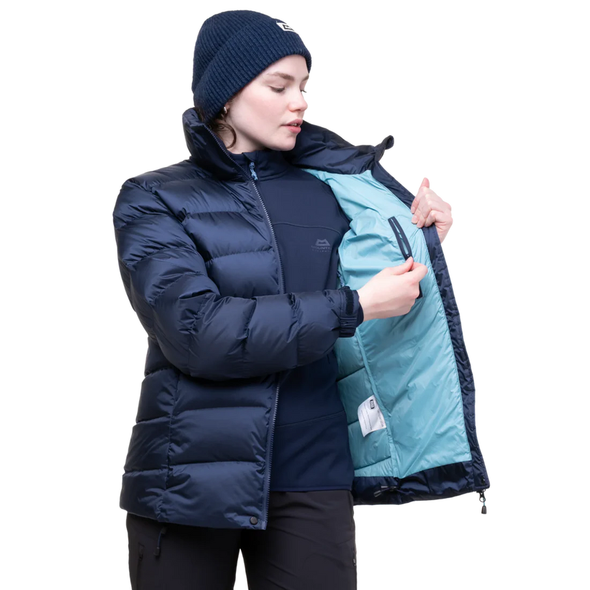 Stitch-through baffle construction detail on Mountain Equipment Lightline Women's Jacket in Cosmos showing 700 fill power down insulation