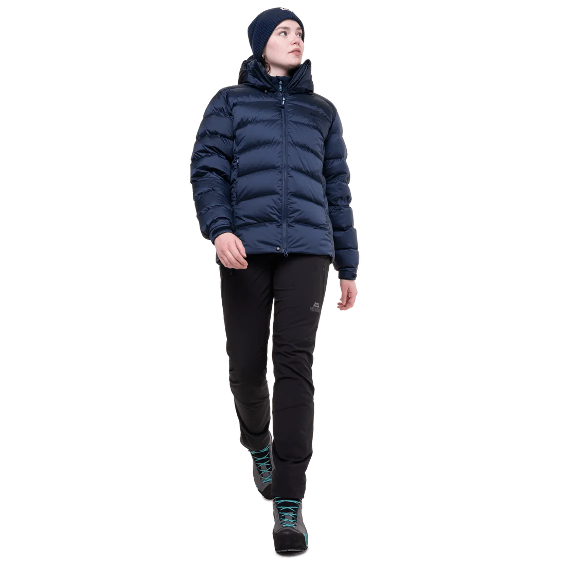 Mountain Equipment Lightline Women's Jacket in Cosmos - lifestyle view showing technical duvet jacket for mountaineering in sub-zero conditions