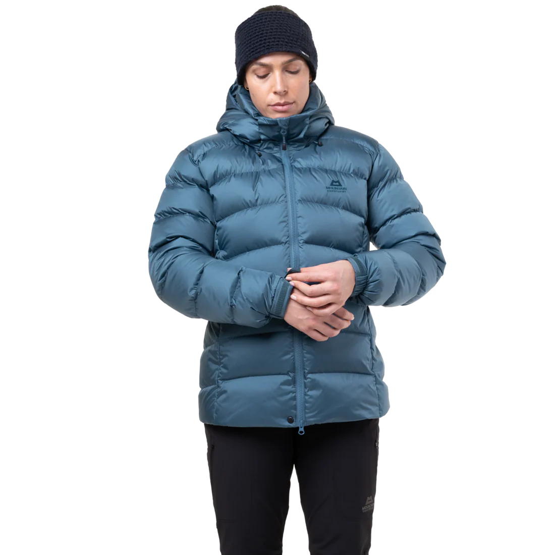 Mountain Equipment Lightline Women's Jacket in Stellar Blue packed into stuff sack showing lightweight packable construction