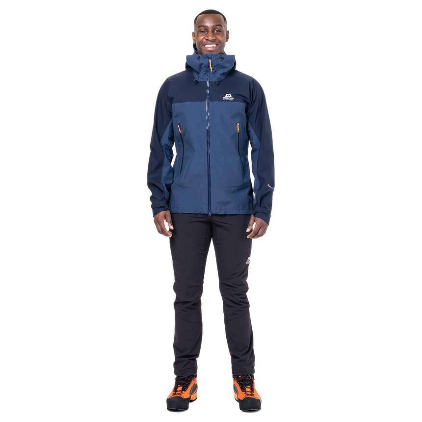 Mountain Equipment Saltoro GORE-TEX Men's Jacket in Dusk/Cosmos - lifestyle view showing waterproof shell for trekking and alpine mountaineering