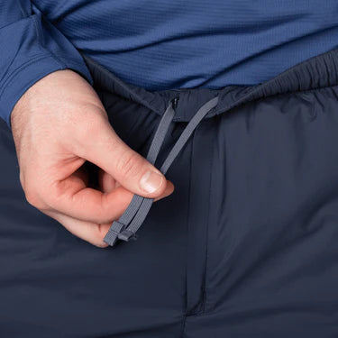 Mountain Equipment Switch Men's Pant in Cosmos - lifestyle view showing fast drying windproof insulated legwear for cold weather mountaineering