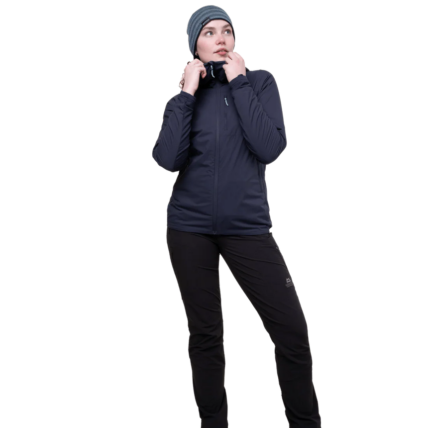 Mountain Equipment Switch Pro Hooded Women's Jacket in Cosmos - lifestyle view showing hybrid breathable mid-layer for alpine climbing and ski touring