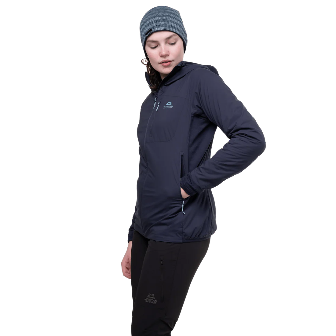 Mountain Equipment Switch Pro Hooded Women's Jacket in Cosmos packed into hand pocket showing lightweight packable construction for alpine and expedition use