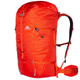 Mountain Equipment Tupilak 45+ Backpack in Magma - side view showing hourglass shape and compression straps