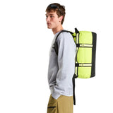The North Face Base Camp Duffel Extra Small Fizz Lime/Lemon Mist/TNF Black - side view with detachable ergonomic shoulder straps and padded handles