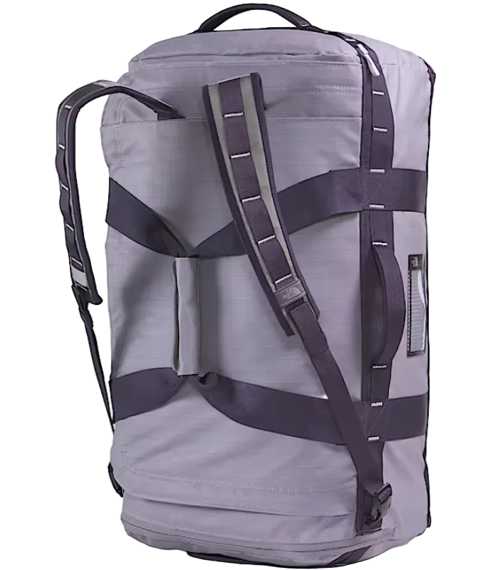 The North Face Base Camp Voyager Duffel 62L Transcendent Grey/Endless Dusk - back panel view showing stowable backpack straps and water-resistant ID window