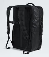 The North Face Base Camp Voyager Travel Pack 35L Black/Asphalt Grey - side view with dual water bottle pockets and daisy-chain webbing