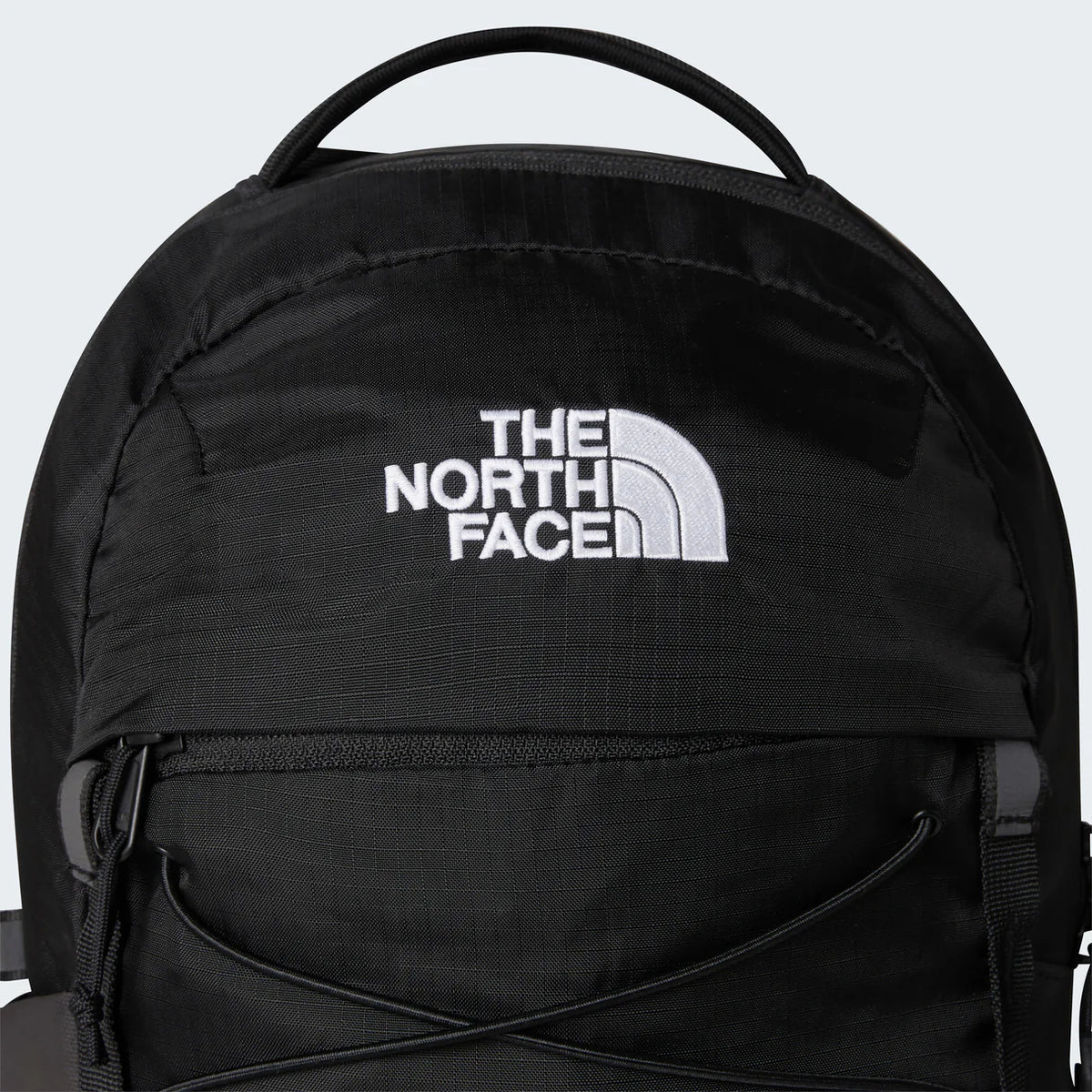 The North Face Borealis Mini Backpack 10L - lifestyle shot showing compact 10 litre design with YKK zippers and abrasion-resistant recycled polyester construction