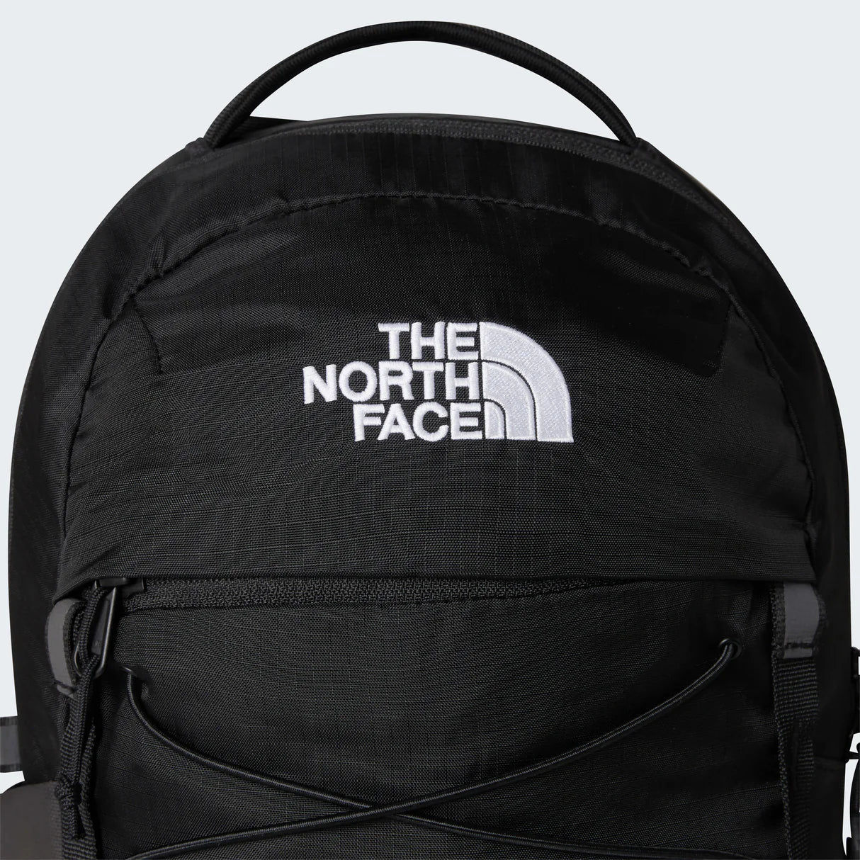The North Face Borealis Mini Backpack 10L - lifestyle shot showing compact 10 litre design with YKK zippers and abrasion-resistant recycled polyester construction